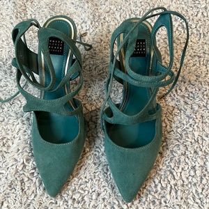 Used once White House black market heels size 6 1/2 off bluish color
